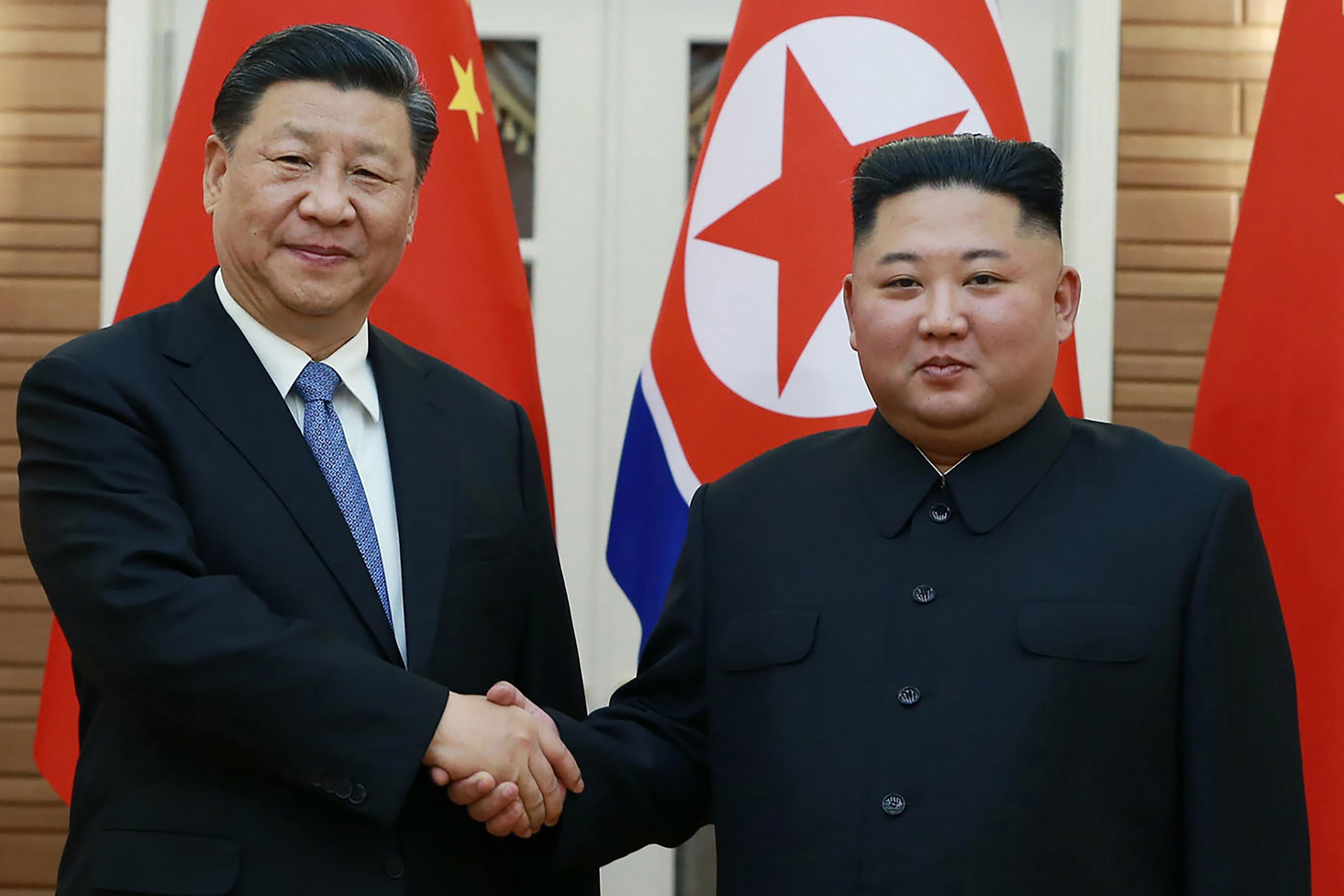 Leaders of China and North Korea vow to strengthen ties KCNA
