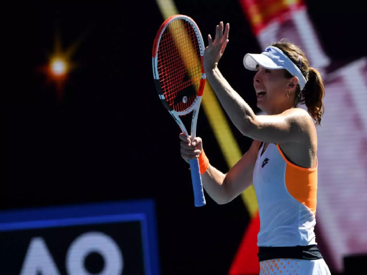 upsets Halep in brutal heat to make Slam quarter on 63rd attempt