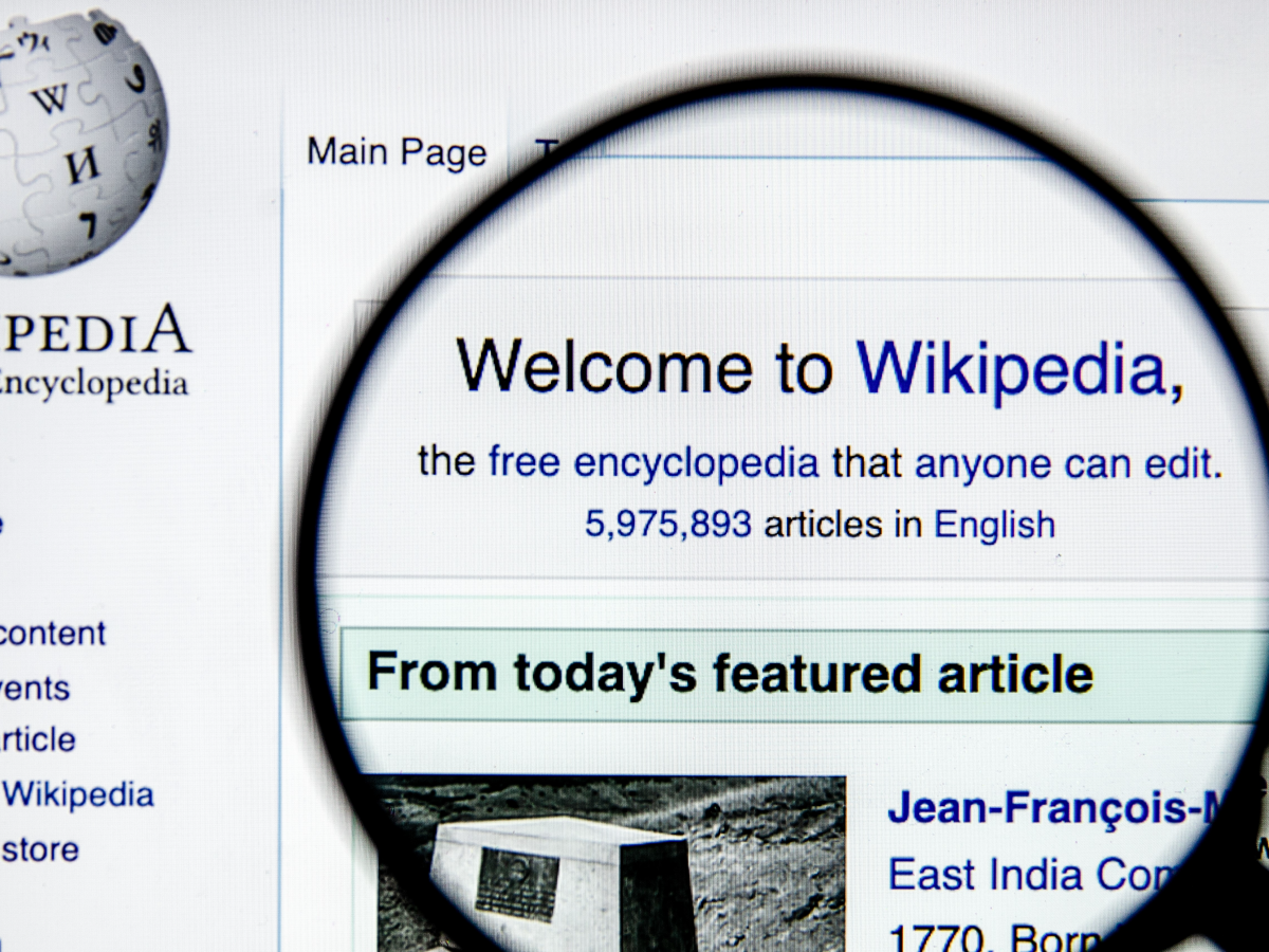 Google agrees to pay for wikipedia content news