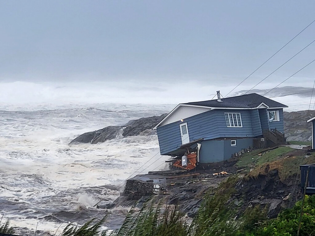 Storm Fiona slams eastern Canada, knocking out power and ripping