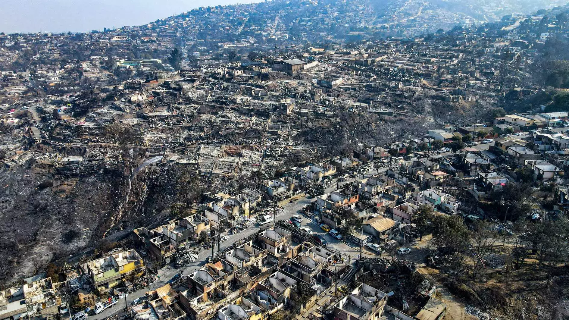 Chile mourns 123 killed in wildfire inferno, searches for missing