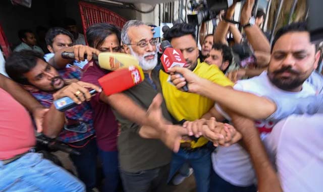 India's top court bails jailed editor in Chinese funding case