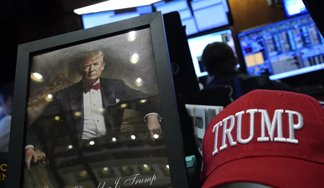 Asian markets swing as Trump revives tariff fears on taking office