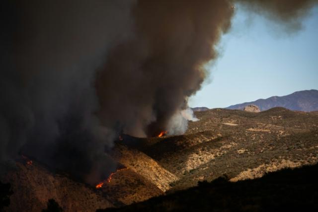 Mass evacuations after explosive new fire erupts near Los Angeles     