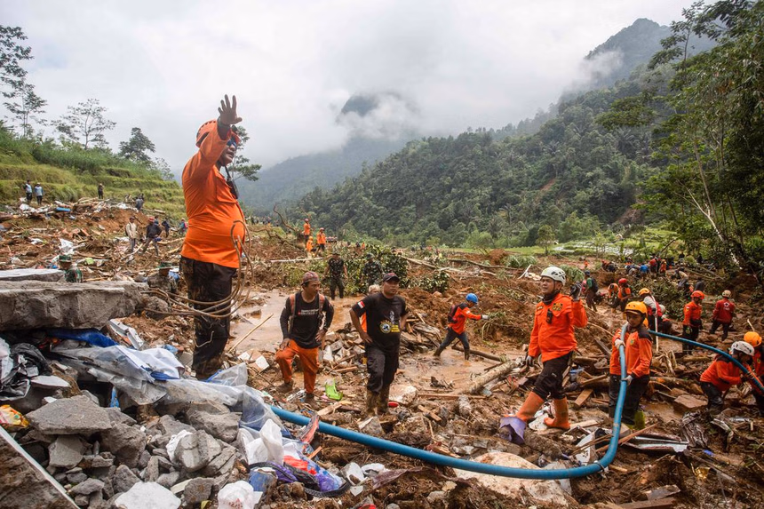 Indonesia landslide death toll rises to 21 as rescuers dig for survivors