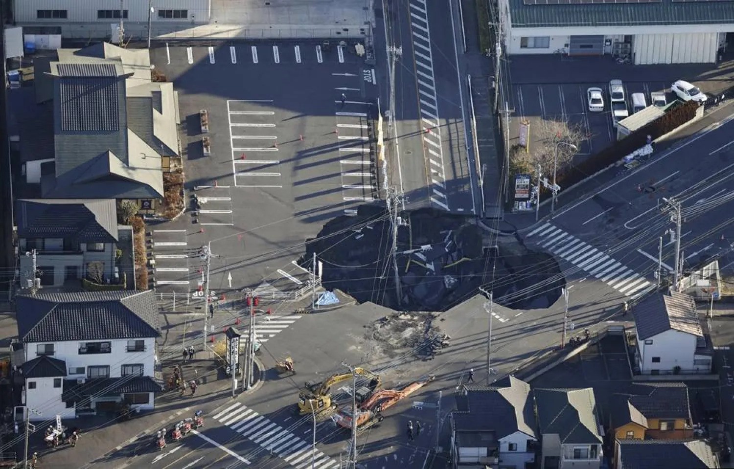 Residents near Japan sinkhole urged to evacuate
