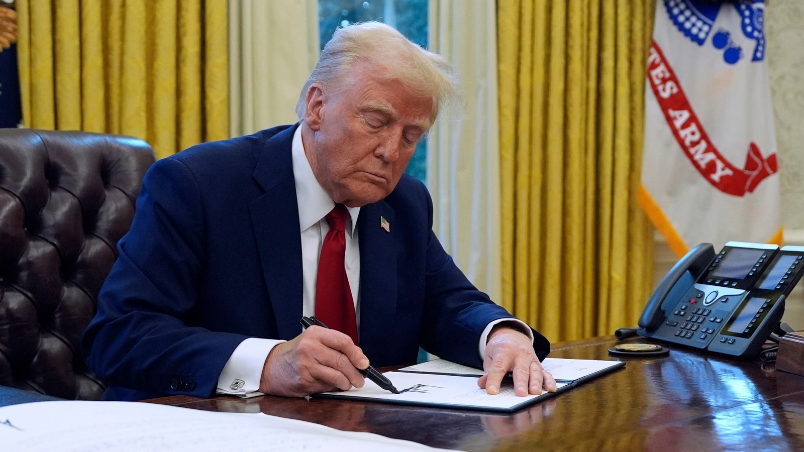 Trump accuses S.Africa of 'confiscating' land, cuts funding