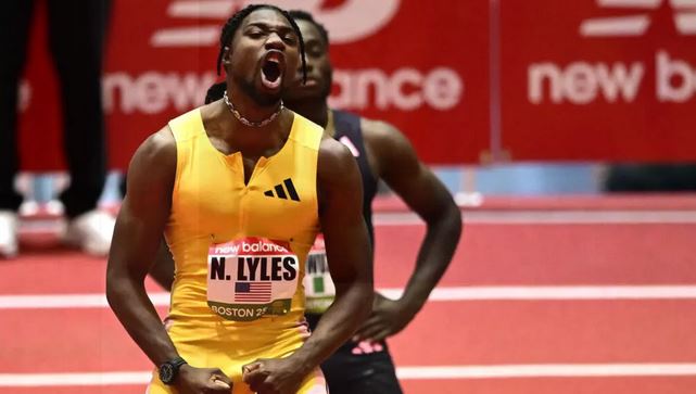 Olympic champions Lyles, Holloway blast to victory in Boston