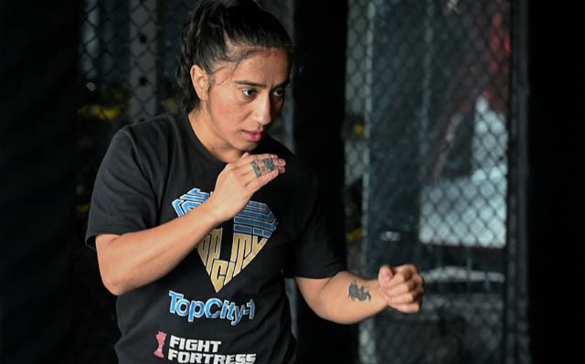 Pioneering Pakistan woman MMA fighter breaks barriers... and arms
