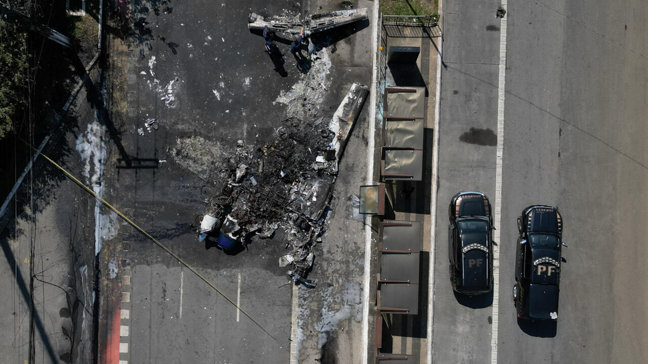 2 dead after small plane crashes on busy Sao Paulo street, hits bus