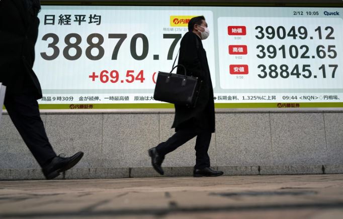 Asian stocks rise as Powell rate warning taken in stride
