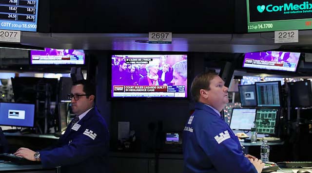 Global stocks buffeted by tariff threats and data