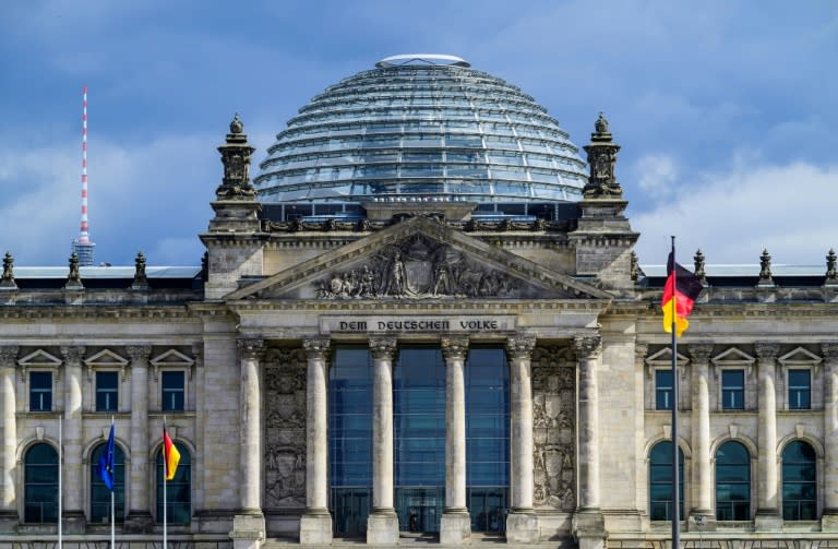 German vote winner Merz faces tough talks to build govt