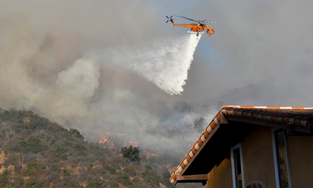 Japan forest fire kills one, prompts evacuations