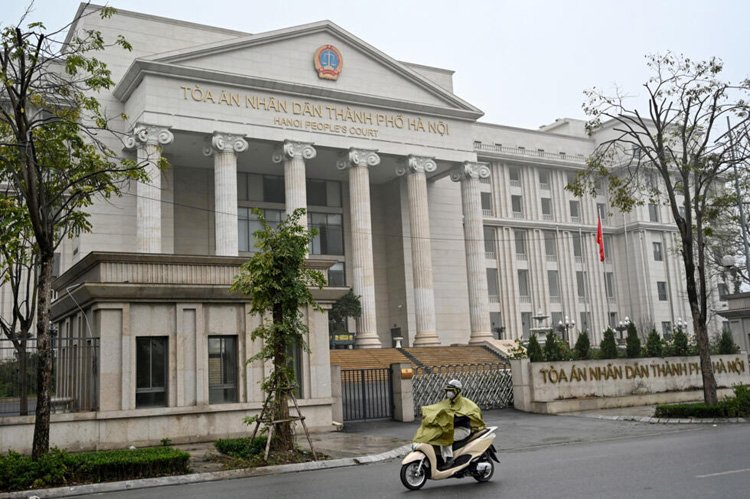 Vietnam jails leading journalist over Facebook posts