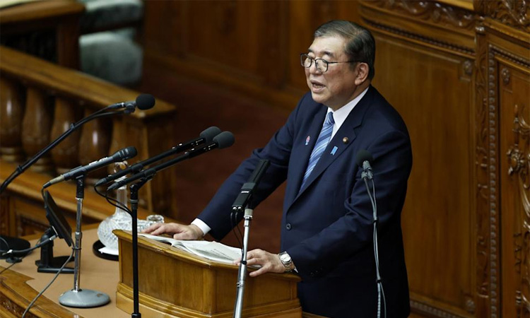 Japan lower house finally passes record budget