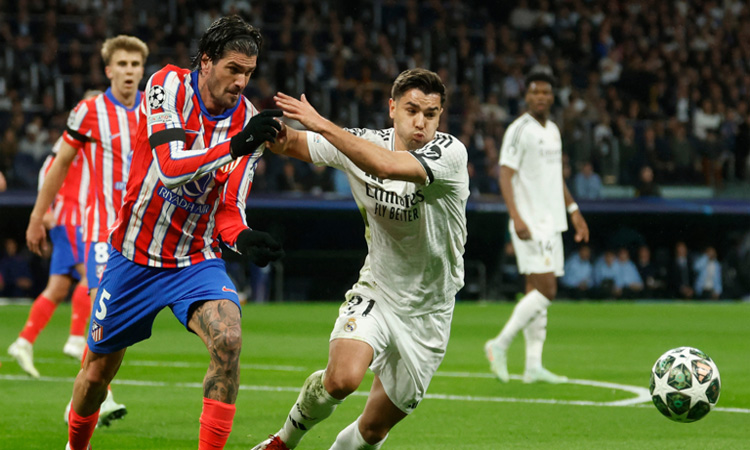 Diaz earns Real Madrid lead on Atletico in Champions League derby clash