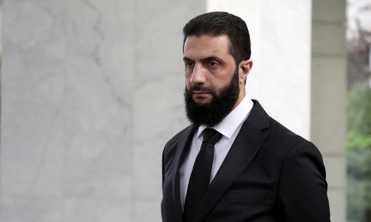 Syrian interim president calls on Assad's supporters to lay down arms