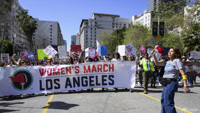 Protesters rally on International Women's Day, fearing far right