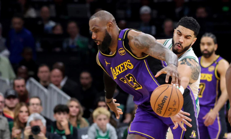 Tatum dominates as Celtics hold off Lakers; James injury scare