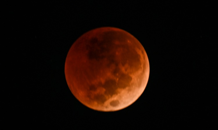 Stargazers marvel at 'Blood Moon', rare total lunar eclipse