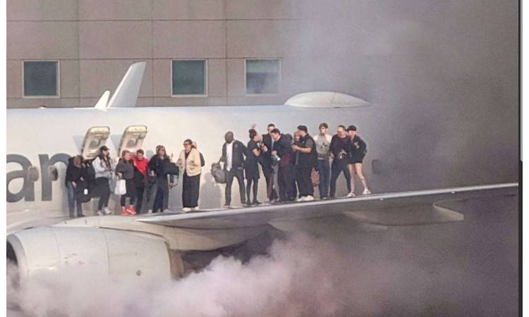Fire aboard US airliner after diverted to Denver, 12 injured