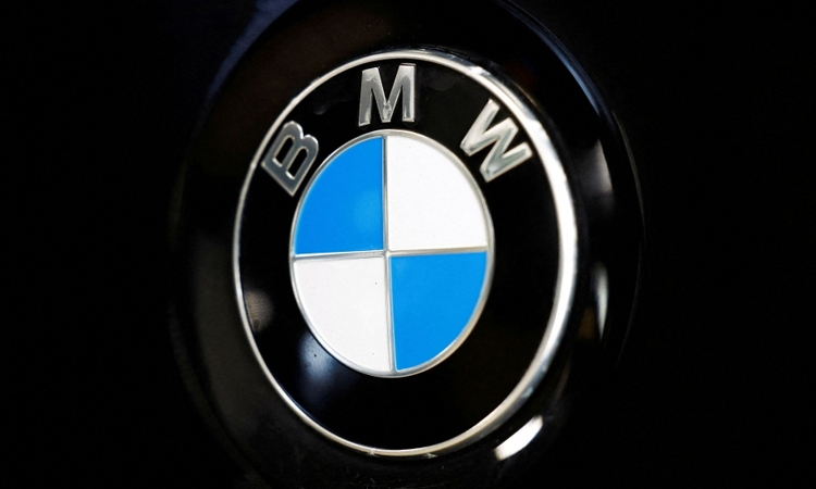 BMW warns on tariffs, China as 2024 profits plunge