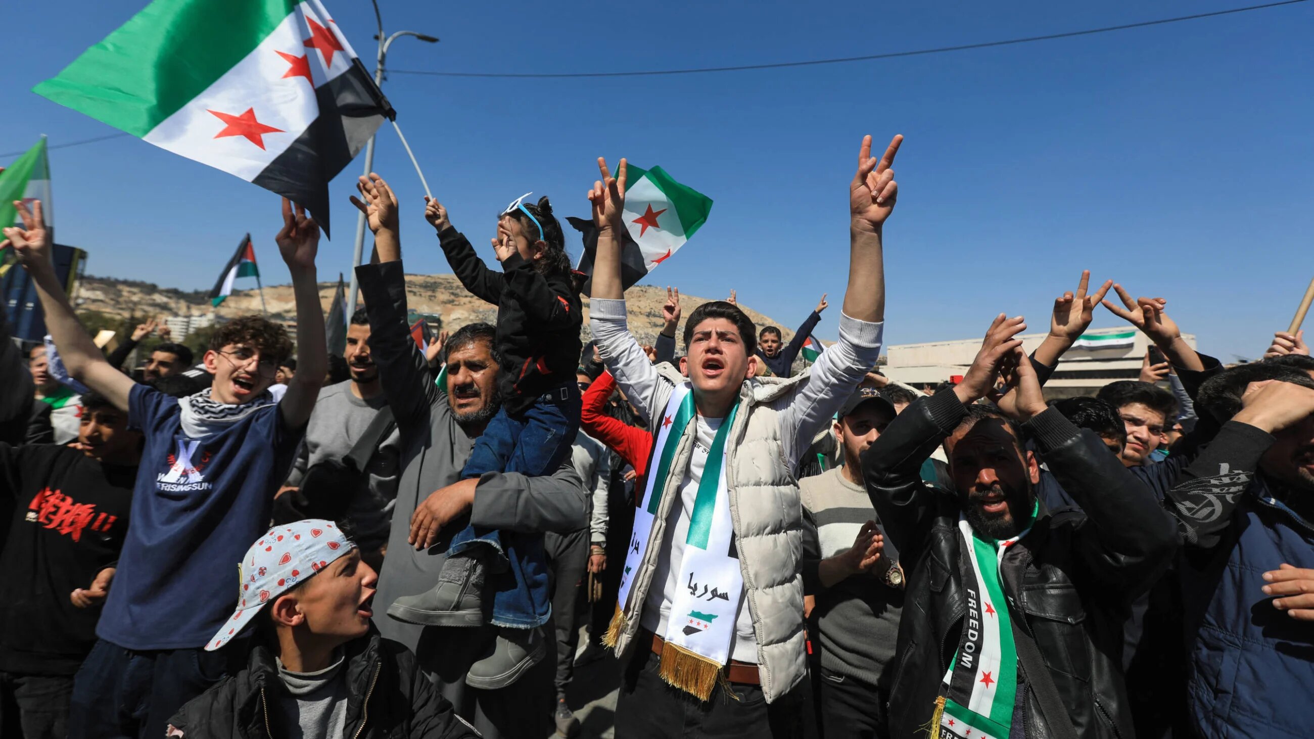 Syrians commemorate uprising anniversary for first time since Assad's fall