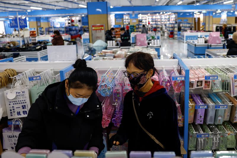China retail sales edge up as officials eye consumption boost