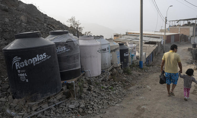 In poor areas of Peru's capital, running water is a dream