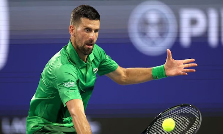 Djokovic marches into Miami quarters as Ruud exits