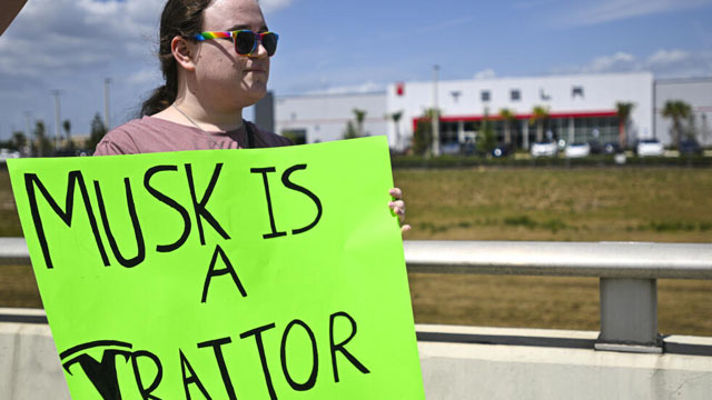 Protesters denounce Musk at Tesla dealerships in US, Europe, Canada