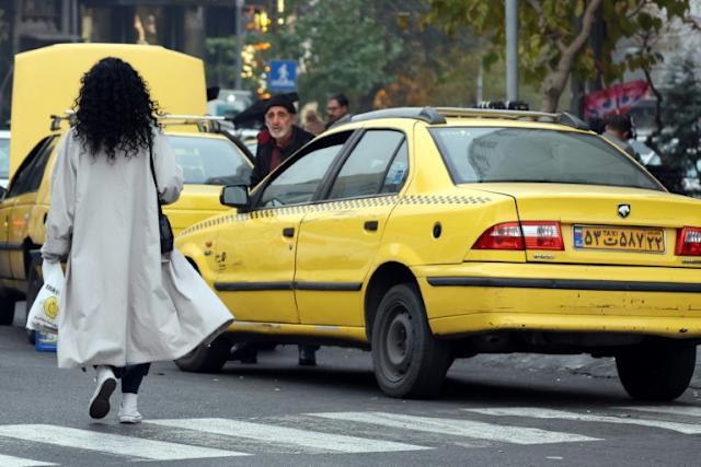 Iran police disperse pro-hijab protesters outside parliament