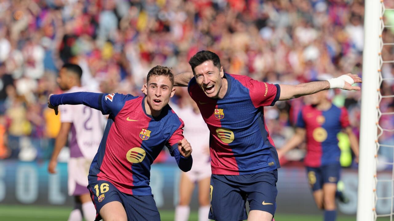 Barca restore Liga lead in Girona romp