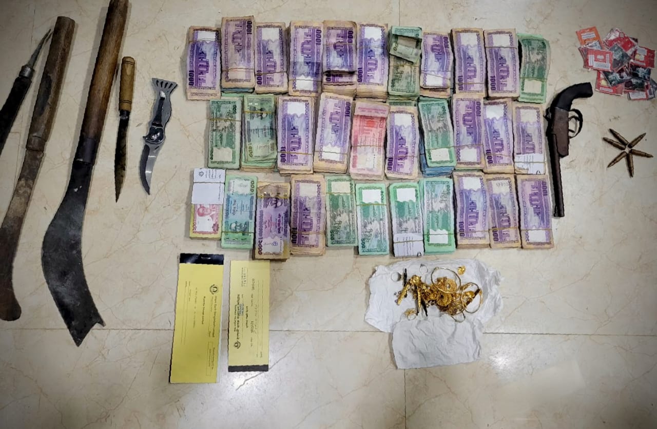 Joint forces seize Tk 30 lakh cash, local weapons in Teknaf