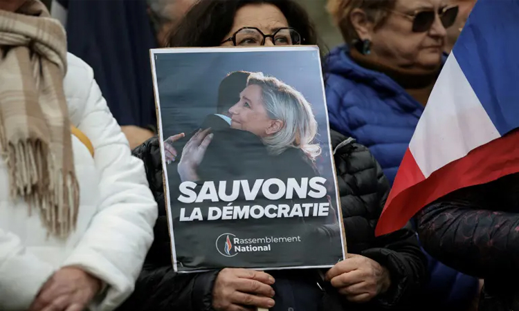 French far right rallies supporters over Le Pen conviction