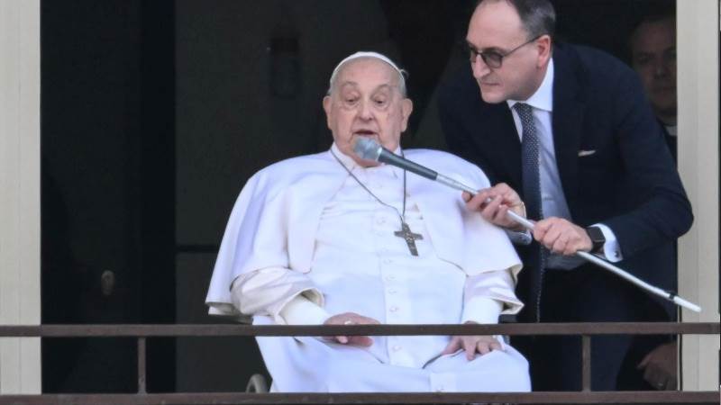 Recovering Pope makes surprise appearance with crowd at Vatican square