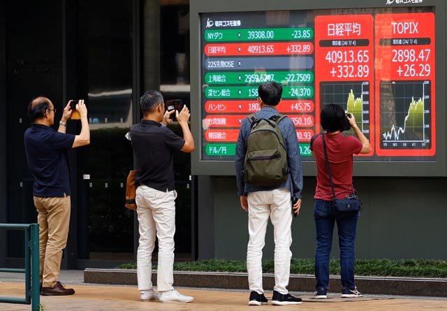 Tokyo's Nikkei index up 5.8% as US tariffs fuel volatility