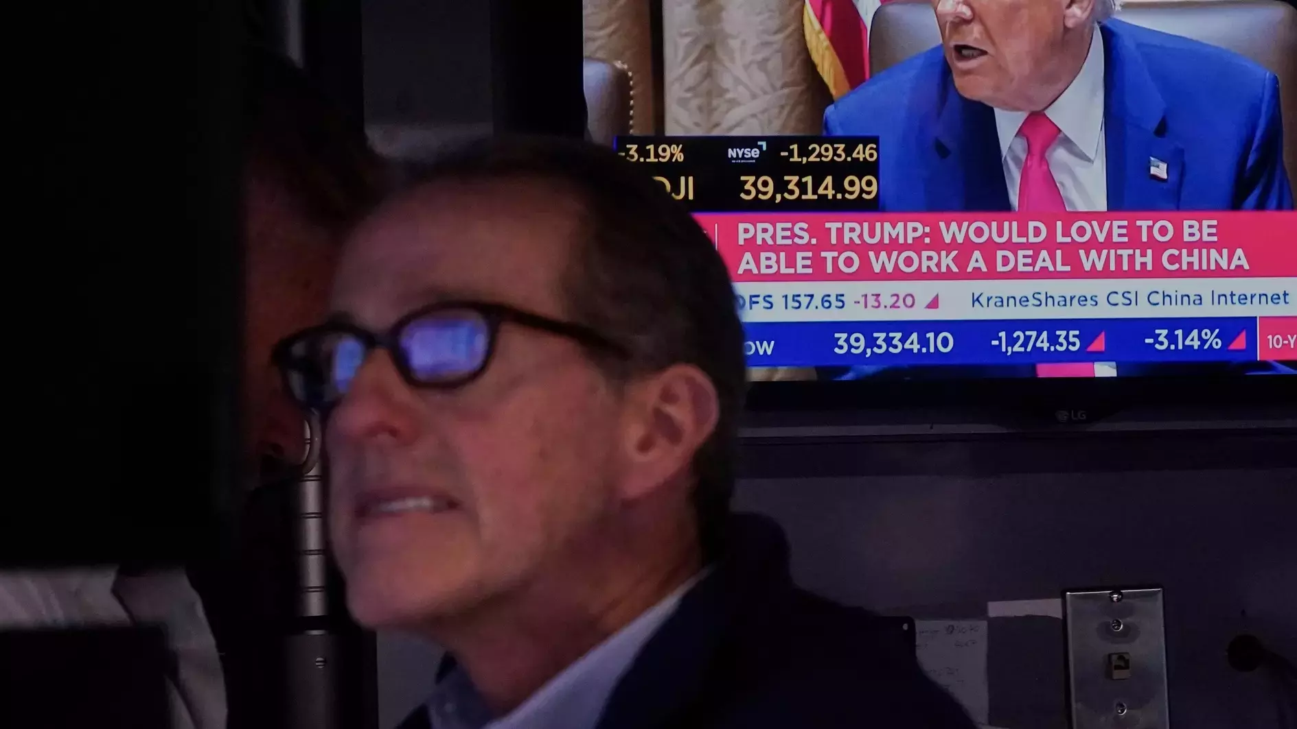 Stocks, dollar hit as Trump admits costs of 'beautiful' trade blitz