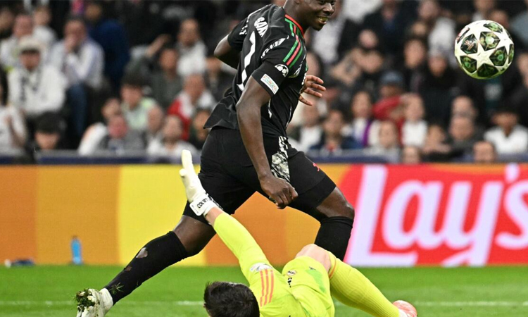 Arsenal oust holders Real Madrid to reach Champions League semis
