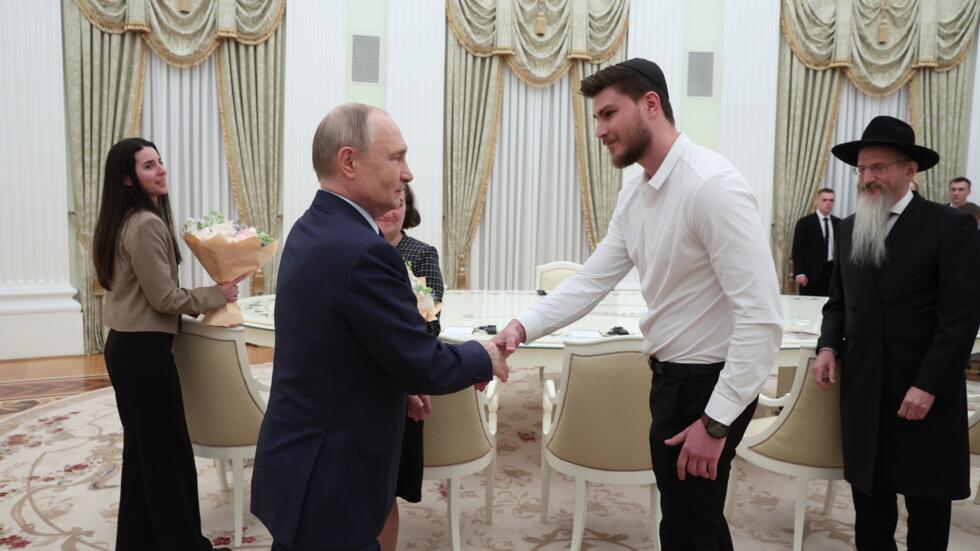 Putin meets Russian-Israeli hostage released by Hamas