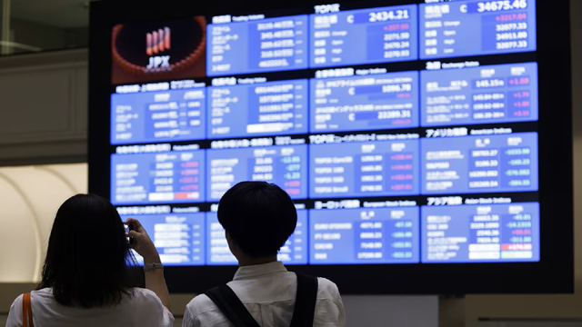 Asian markets mixed as traders track tariff talks