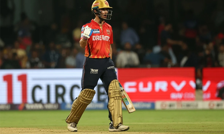 Bowlers and Wadhera shine as Punjab beats Bengaluru in rain-hit IPL game