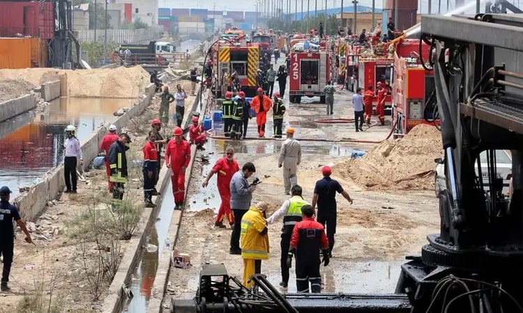 Iran says fire contained after deadly blast at key port