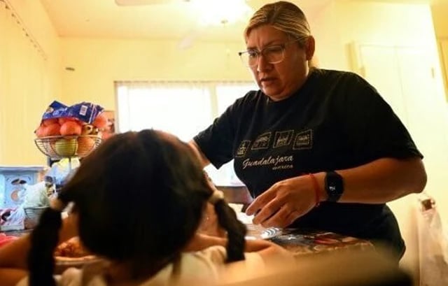 100 days of Trump: Migrants fret over deportation