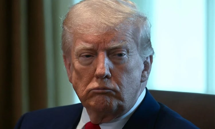 US economy shrinks, Trump blames Biden