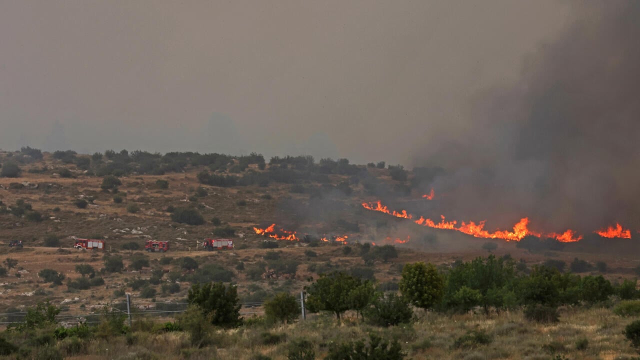 Israel reopens key roads as firefighter’s battle blaze