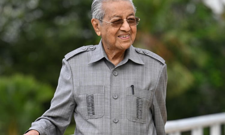 Nearing 100, Malaysian ex-PM Mahathir blasts 'old world' Trump