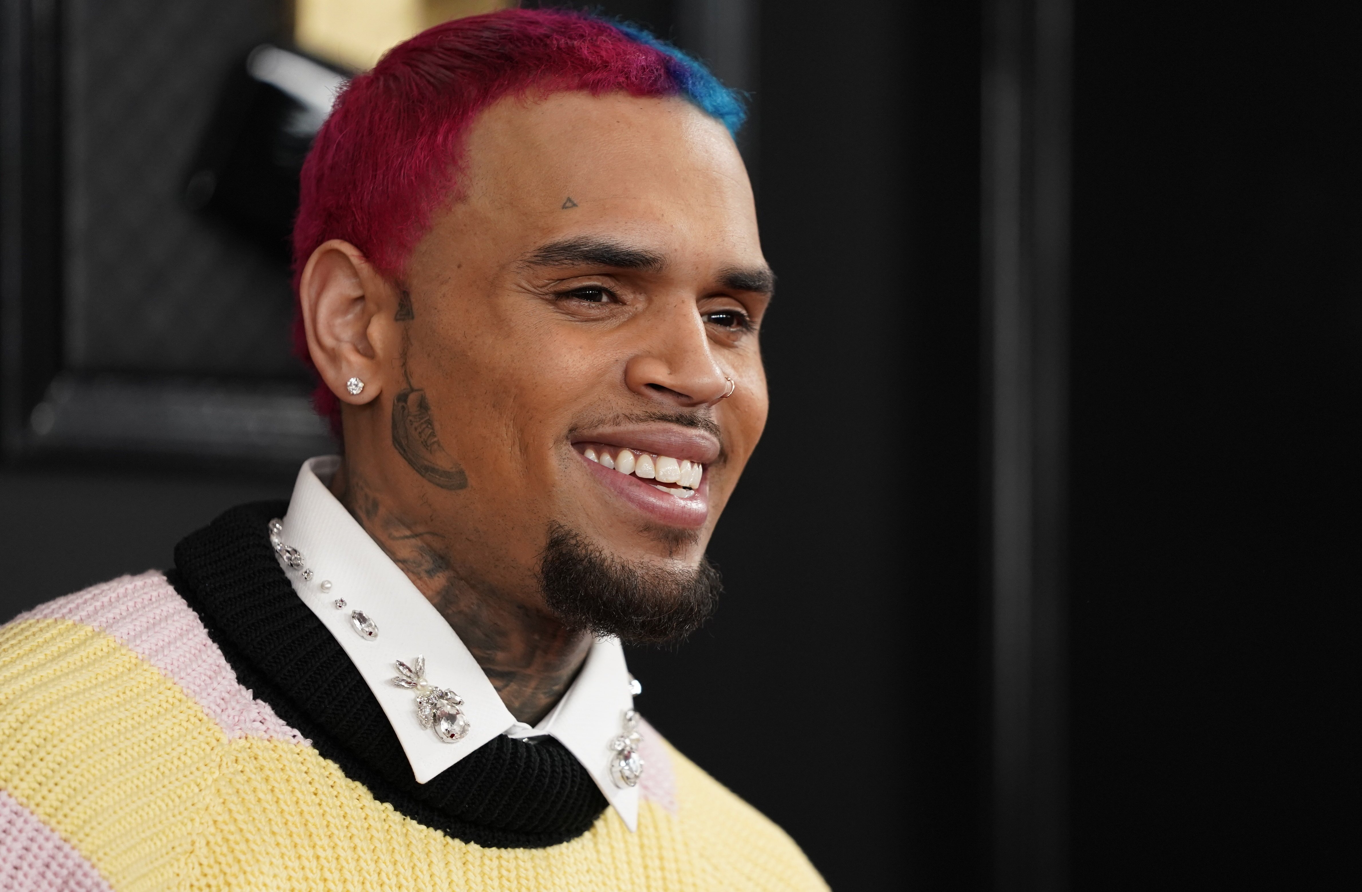 US singer Chris Brown charged with assault in Britain
