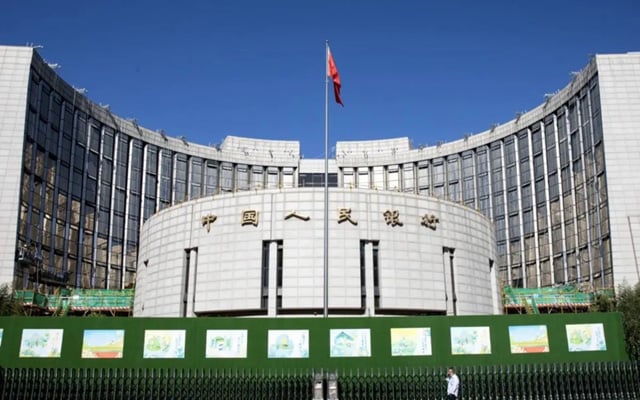 China's central bank cuts two key rates to historic lows